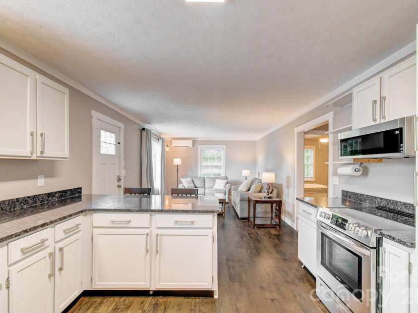 182 Ellerslie Acre None, Hendersonville, NC 28739.  MLS# CAR4385245, YatesRealty ID 48627. Second home kitchen and living space