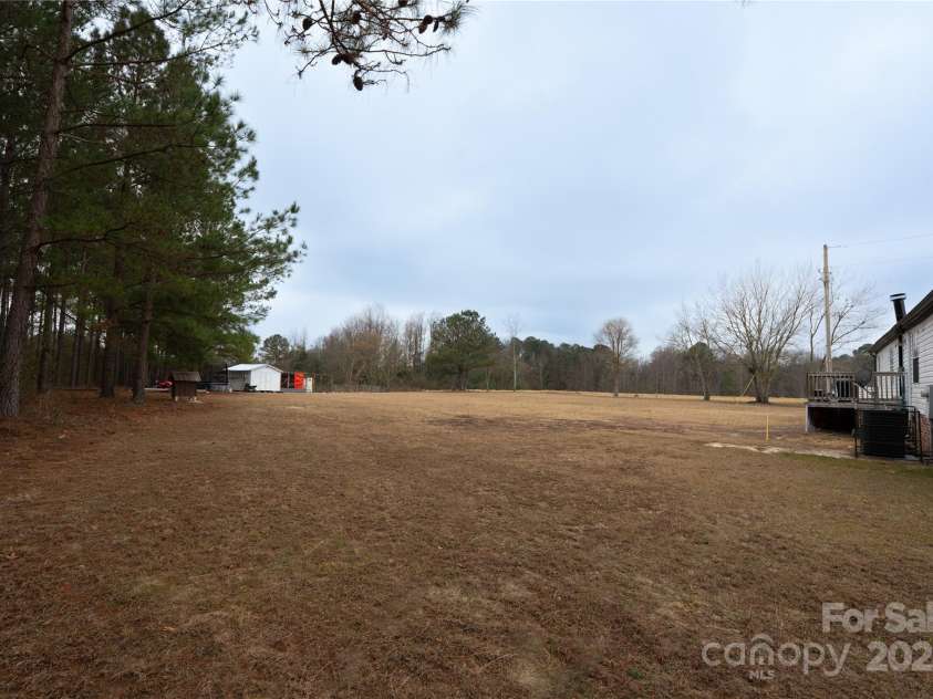 2235 Sandy Ridge Church Road, Morven, NC 28119.  MLS# CAR4331626, YatesRealty ID 4863. Chicken coop with chickens and ducks included