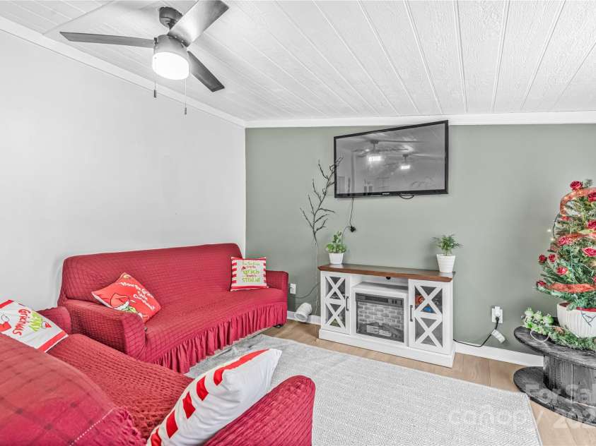 2235 Sandy Ridge Church Road, Morven, NC 28119.  MLS# CAR4331626, YatesRealty ID 4863. Foyer-- cooled with a portable AC and heated with the electric fireplace which does NOT convey