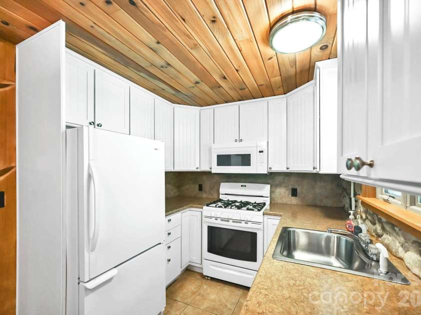 26 Candler School Road, Candler, NC 28715.  MLS# CAR4417181, YatesRealty ID 48630. 