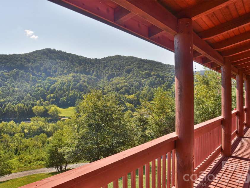 27 Winn Drive, Leicester, NC 28748.  MLS# CAR4419621, YatesRealty ID 48643. Another view from the front porch.