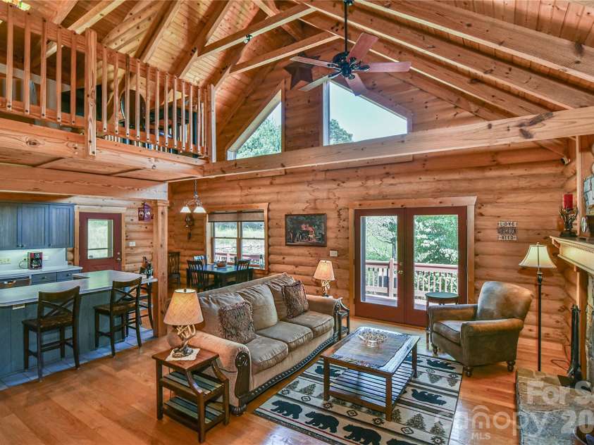 27 Winn Drive, Leicester, NC 28748.  MLS# CAR4419621, YatesRealty ID 48643. As you enter this immaculate space, note the soaring ceiling and sturdy post and beam construction! The definition of mountain comfort.