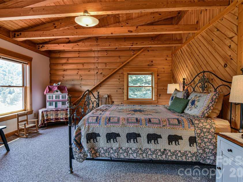 27 Winn Drive, Leicester, NC 28748.  MLS# CAR4419621, YatesRealty ID 48643. Bedroom Two. The views from the windows is wonderful!