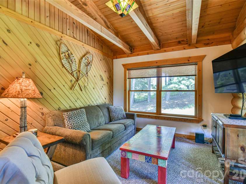27 Winn Drive, Leicester, NC 28748.  MLS# CAR4419621, YatesRealty ID 48643. Loft, View 2. What a cozy space!