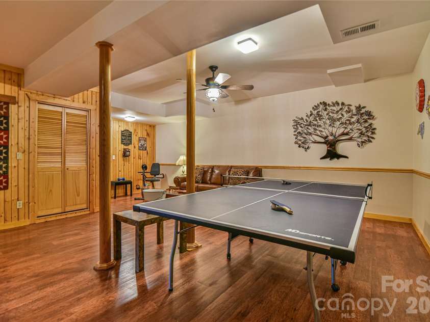27 Winn Drive, Leicester, NC 28748.  MLS# CAR4419621, YatesRealty ID 48643. Sweet Game Room!