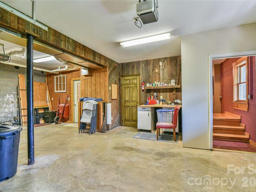 27 Winn Drive, Leicester, NC 28748.  MLS# CAR4419621, YatesRealty ID 48643. Two-Car Garage