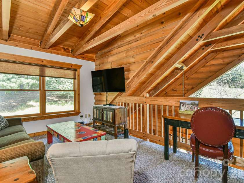 27 Winn Drive, Leicester, NC 28748.  MLS# CAR4419621, YatesRealty ID 48643. Upstairs loft. So nice!