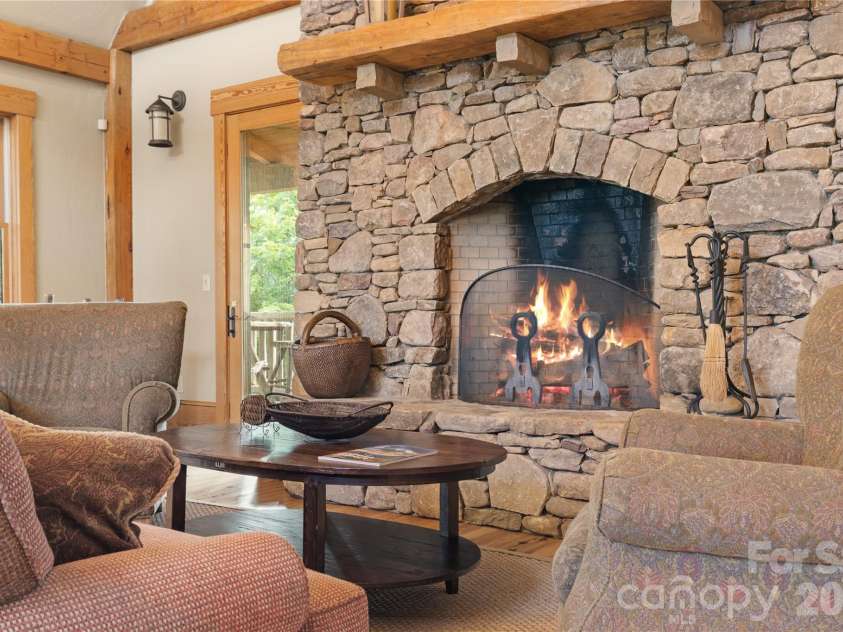 1915 Creston Drive, Black Mountain, NC 28711.  MLS# CAR4402197, YatesRealty ID 48644. Cozy up around the fire