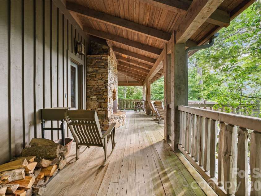 1915 Creston Drive, Black Mountain, NC 28711.  MLS# CAR4402197, YatesRealty ID 48644. Full wrap around deck at community center.