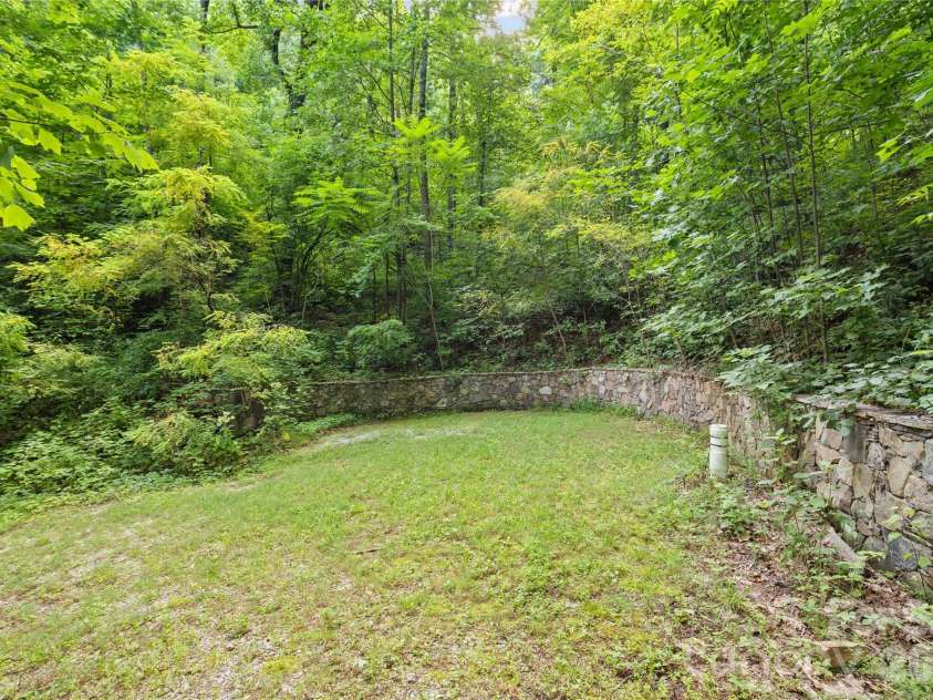1915 Creston Drive, Black Mountain, NC 28711.  MLS# CAR4402197, YatesRealty ID 48644. Landing spot halfway up driveway where high producing well is installed.