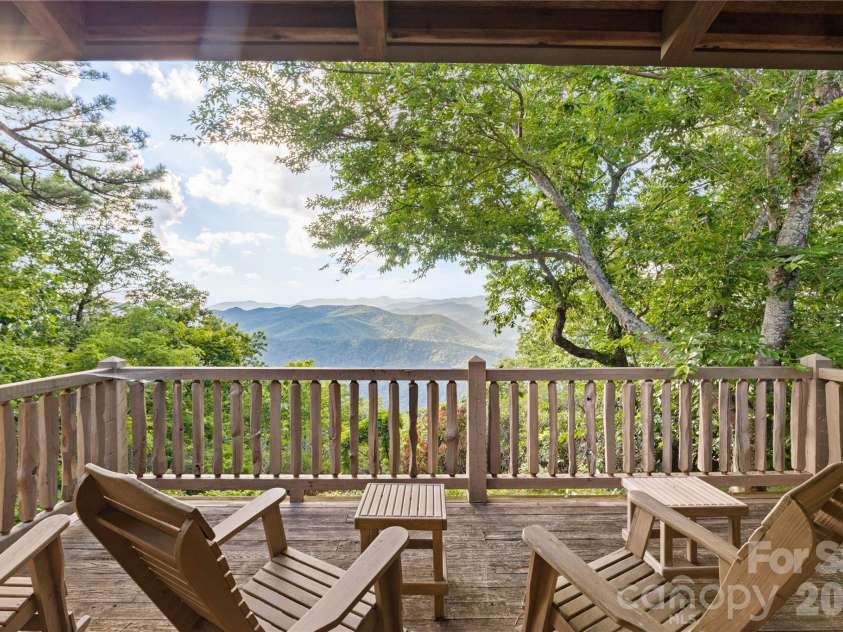 1915 Creston Drive, Black Mountain, NC 28711.  MLS# CAR4402197, YatesRealty ID 48644. Unwind taking in long range views of protected conserved land.