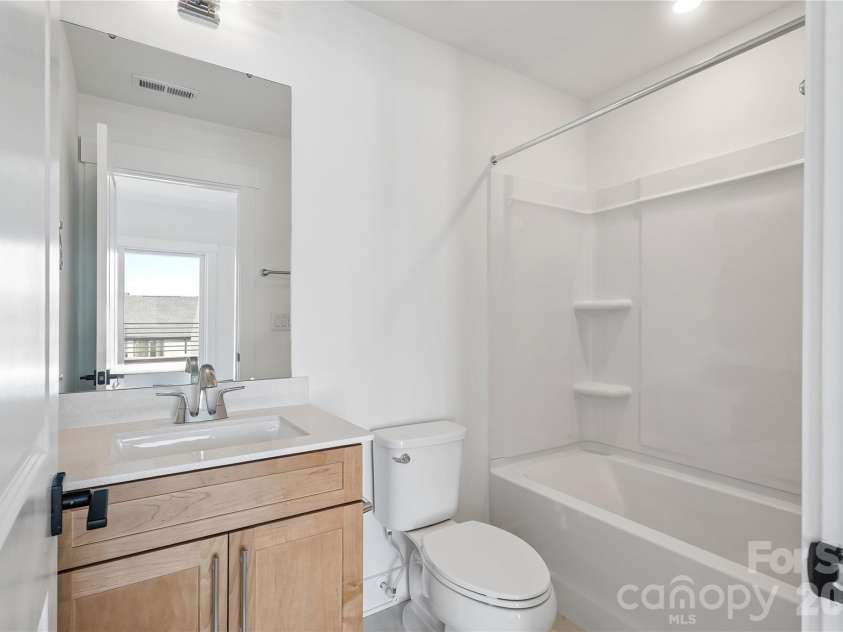 3704 Tryon Street, Charlotte, NC 28217.  MLS# CAR4421301, YatesRealty ID 48648. Guest bath