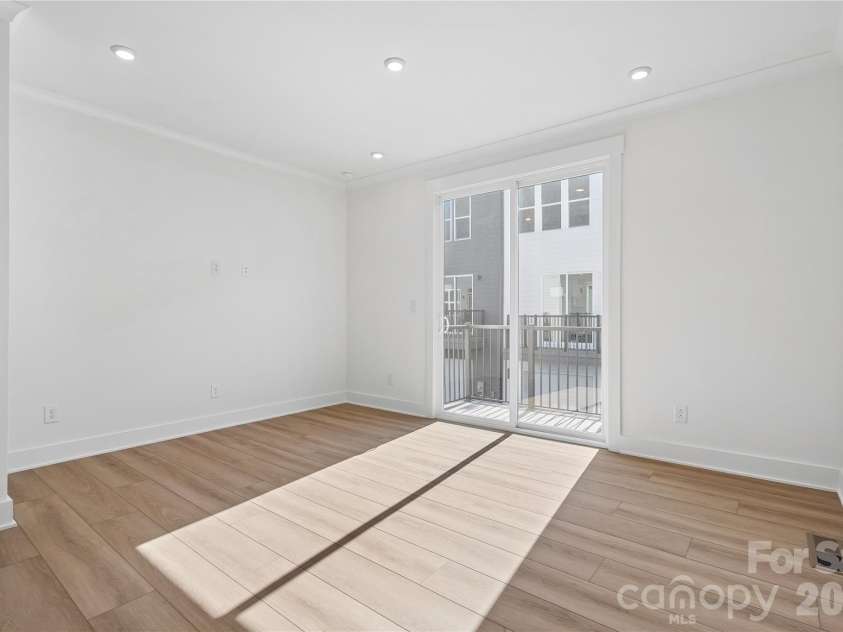 3704 Tryon Street, Charlotte, NC 28217.  MLS# CAR4421301, YatesRealty ID 48648. Large great room with deck access - Representative Photo