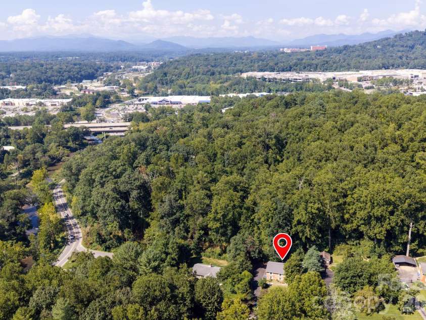 65 Beechwood Road, Asheville, NC 28805.  MLS# CAR4420830, YatesRealty ID 48649. 