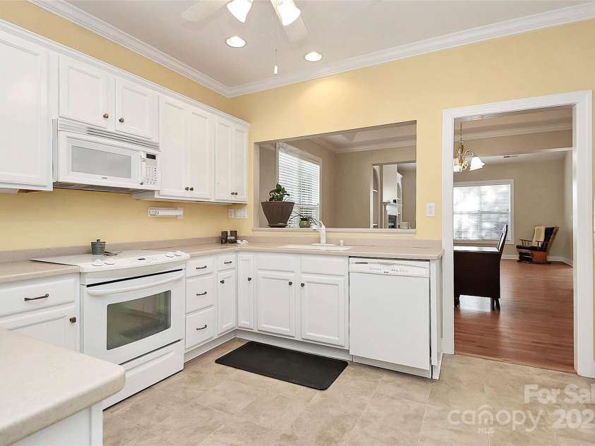 10046 Bishops Gate Boulevard, Pineville, NC 28134.  MLS# CAR4322219, YatesRealty ID 4865. PASS THROUGH WINDOW & WORK AREA