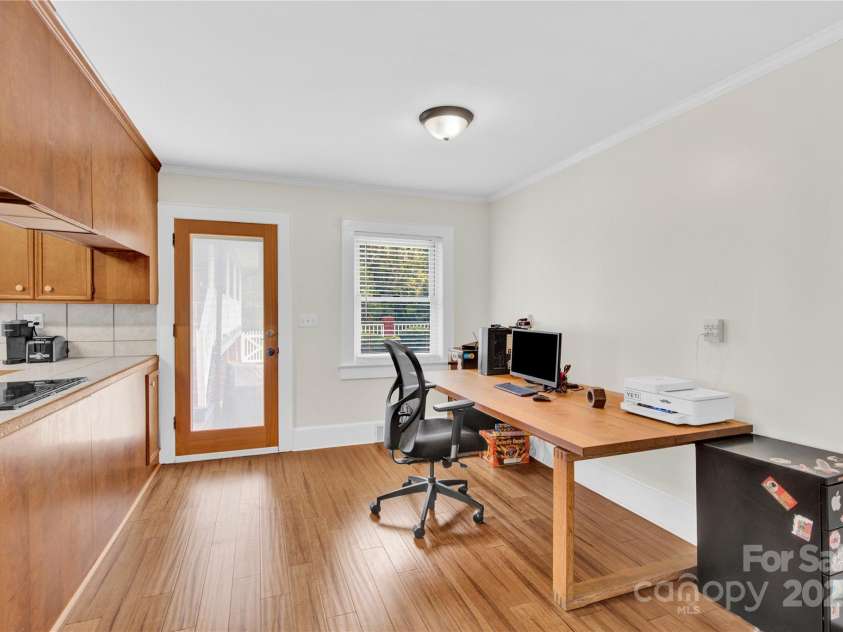 11720 Kluttz Road, Gold Hill, NC 28071.  MLS# CAR4310441, YatesRealty ID 4865. Breakfast area currently used as office space