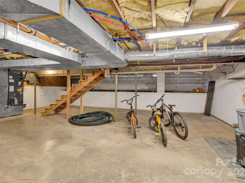 11720 Kluttz Road, Gold Hill, NC 28071.  MLS# CAR4310441, YatesRealty ID 4865. Unfinished basement area