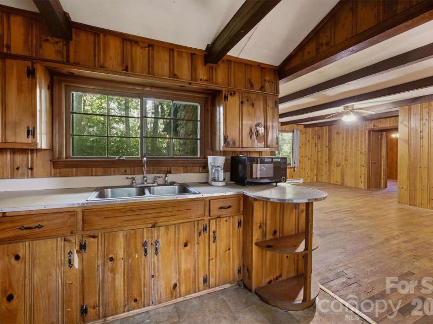 7036 Rhododendron Drive, Newland, NC 28657.  MLS# CAR4420538, YatesRealty ID 48650. 