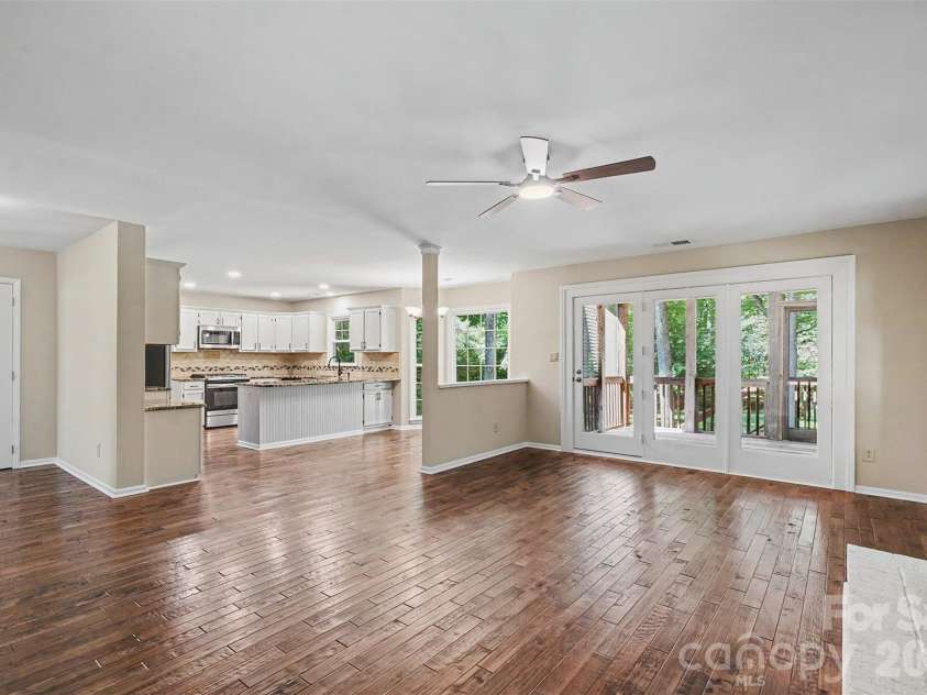 6443 High Creek Court, Charlotte, NC 28277.  MLS# CAR4420225, YatesRealty ID 48657. Open living space flows into the kitchen