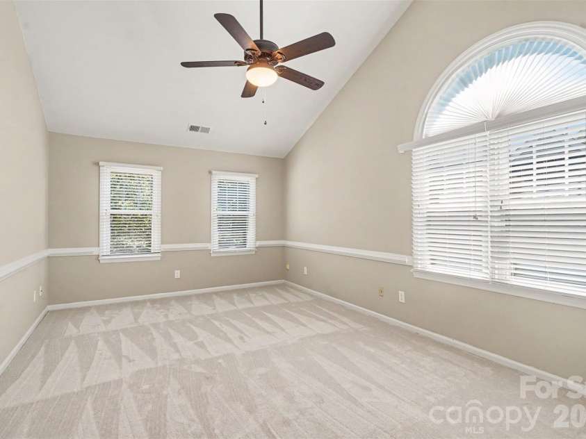 6443 High Creek Court, Charlotte, NC 28277.  MLS# CAR4420225, YatesRealty ID 48657. Primary bedroom features a vaulted ceiling