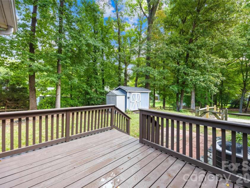 1112 Coachlight Circle, Charlotte, NC 28262.  MLS# CAR4420288, YatesRealty ID 48667. Freshly painted deck is great for BBQs and summer fun.