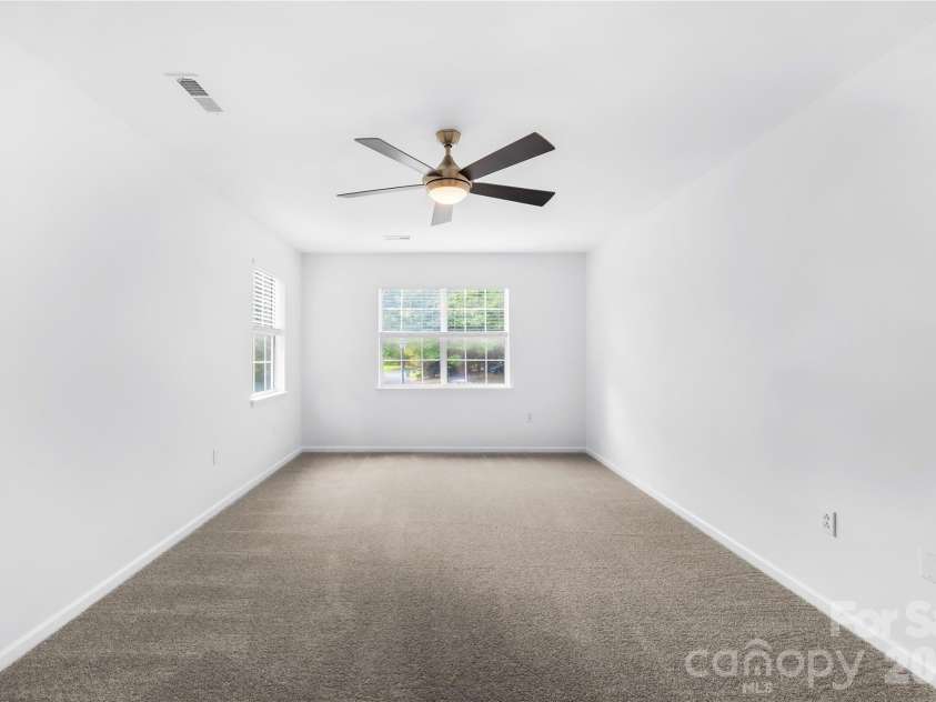 1112 Coachlight Circle, Charlotte, NC 28262.  MLS# CAR4420288, YatesRealty ID 48667. Primary bedroom perfect for rest and relaxation.