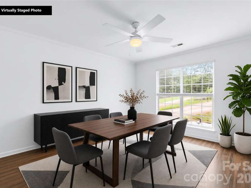 1112 Coachlight Circle, Charlotte, NC 28262.  MLS# CAR4420288, YatesRealty ID 48667. Virtually staged dining room.