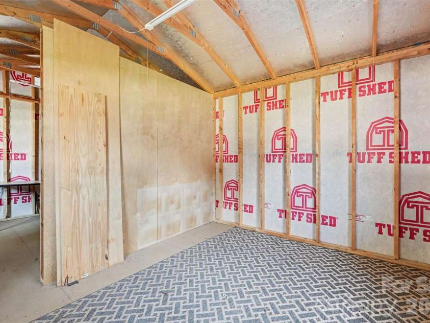 1911 Central Drive, Kannapolis, NC 28083.  MLS# CAR4420924, YatesRealty ID 48678. Inside of blue shed