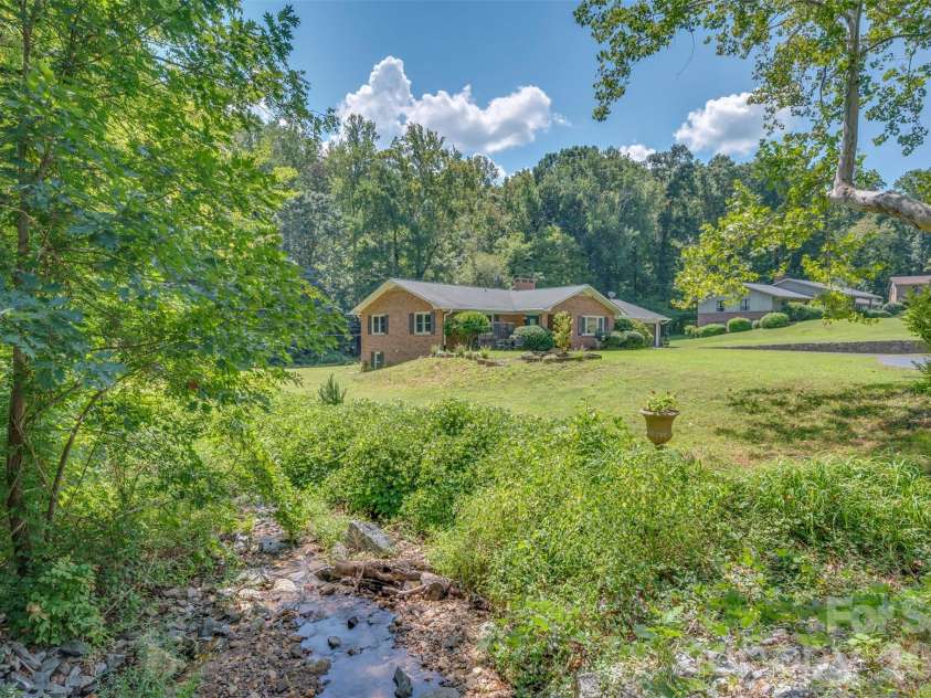 15 Meadowlark Drive, Tryon, NC 28782.  MLS# CAR4421124, YatesRealty ID 48690. 