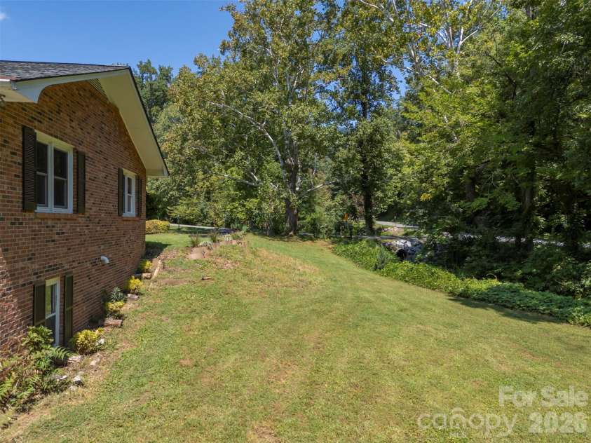 15 Meadowlark Drive, Tryon, NC 28782.  MLS# CAR4421124, YatesRealty ID 48690. 
