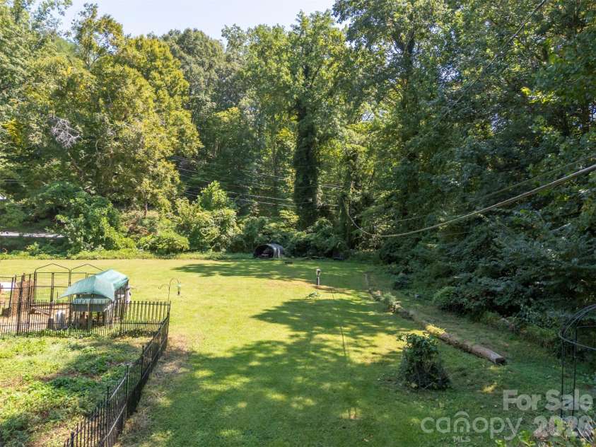 15 Meadowlark Drive, Tryon, NC 28782.  MLS# CAR4421124, YatesRealty ID 48690. 
