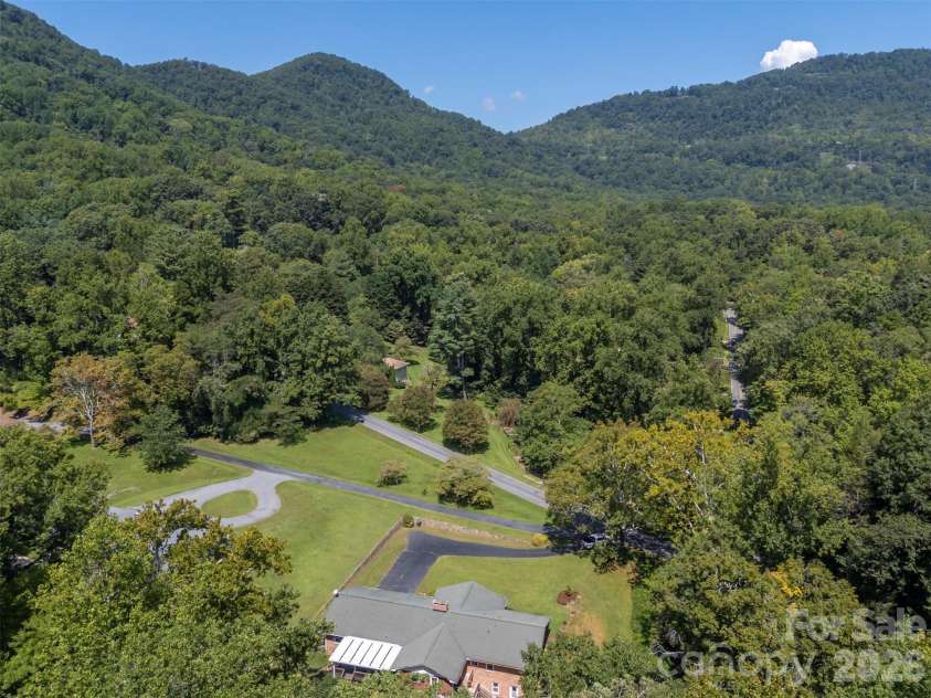 15 Meadowlark Drive, Tryon, NC 28782.  MLS# CAR4421124, YatesRealty ID 48690. 