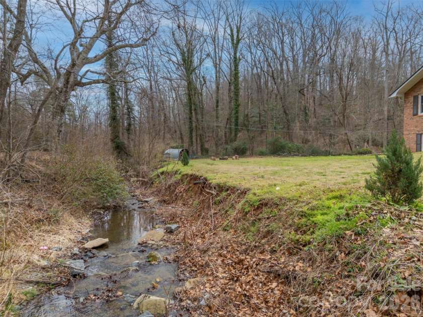 15 Meadowlark Drive, Tryon, NC 28782.  MLS# CAR4421124, YatesRealty ID 48690. 