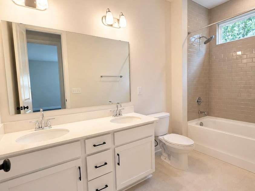 812 19th Street, Charlotte, NC 28205.  MLS# CAR4415955, YatesRealty ID 48692. Dual sink Bathroom
