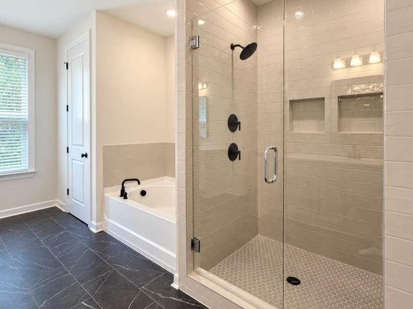 812 19th Street, Charlotte, NC 28205.  MLS# CAR4415955, YatesRealty ID 48692. Primary Bathroom Frameless Shower,Tub