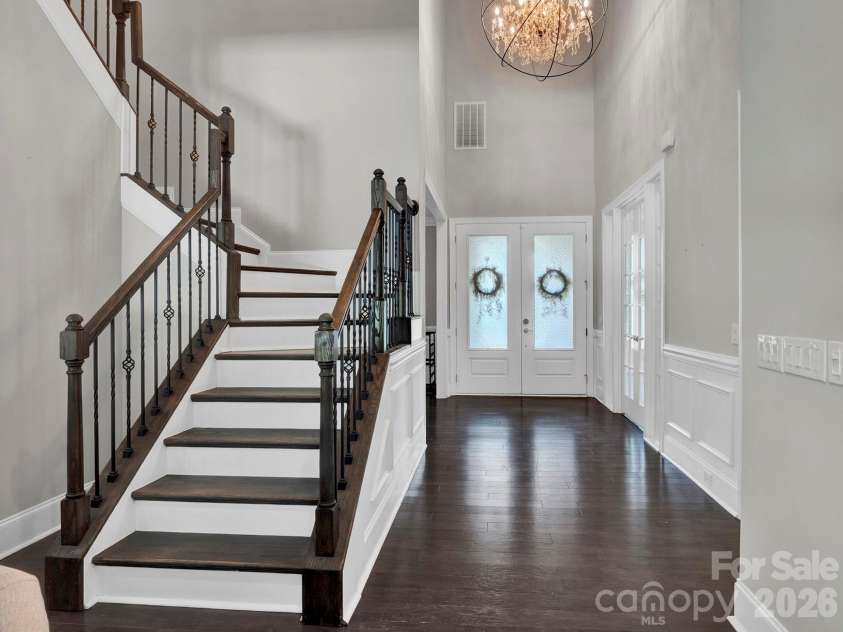 15956 Reynolds Drive, Indian Land, SC 29707.  MLS# CAR4416338, YatesRealty ID 48699. Beautiful staircase