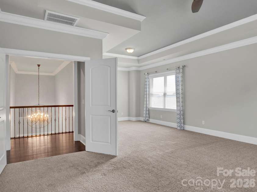 15956 Reynolds Drive, Indian Land, SC 29707.  MLS# CAR4416338, YatesRealty ID 48699. Primary bedroom with double doors