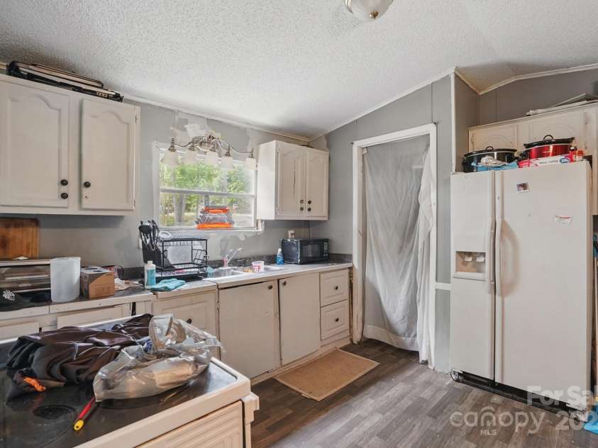 10420 Silver Mine Road, Indian Land, SC 29707.  MLS# CAR4251908, YatesRealty ID 4870. Another interior view to reference condition of kitchen