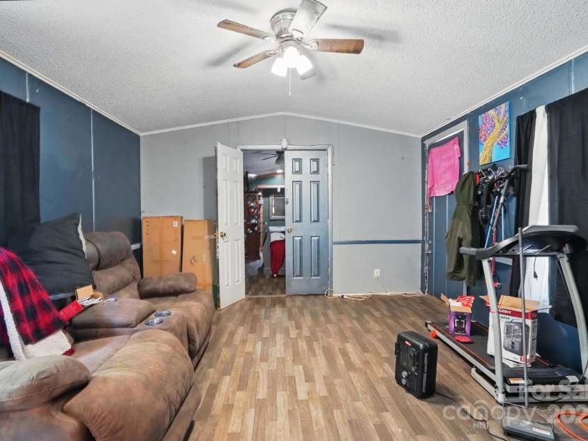 10420 Silver Mine Road, Indian Land, SC 29707.  MLS# CAR4251908, YatesRealty ID 4870. Interior view of Living Room to reference condition