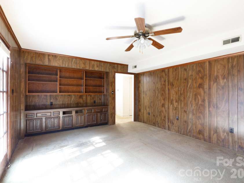 6323 Chalyce Lane, Charlotte, NC 28270.  MLS# CAR4418744, YatesRealty ID 48709. Den w/ built ins