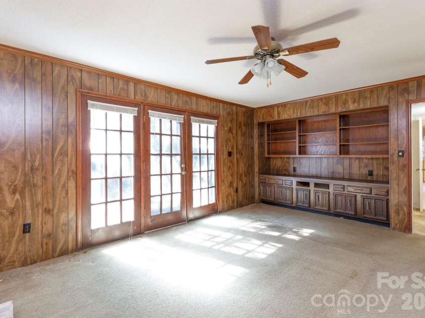 6323 Chalyce Lane, Charlotte, NC 28270.  MLS# CAR4418744, YatesRealty ID 48709. Den w patio doors
