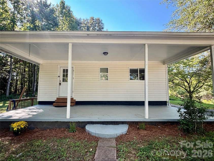 6622 Mountain Grove Road, Hickory, NC 28602.  MLS# CAR4421600, YatesRealty ID 48719. Side patio/carport