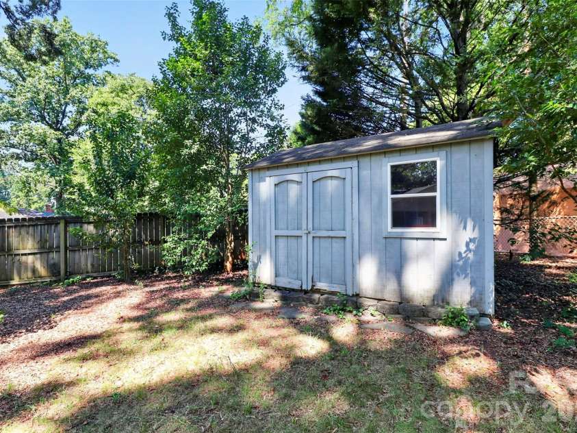 831 Faircrest Drive, Charlotte, NC 28210.  MLS# CAR4421440, YatesRealty ID 48734. Shed to remain conveys as-is