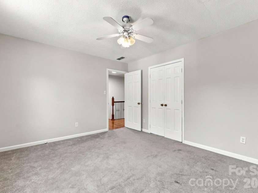 105 Peach Orchard Drive, Greensboro, NC 27455.  MLS# CAR4421350, YatesRealty ID 48737. SECONDARY BEDROOM 1