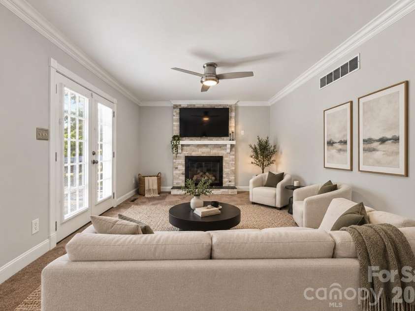 105 Peach Orchard Drive, Greensboro, NC 27455.  MLS# CAR4421350, YatesRealty ID 48737. VIRTUALLY STAGED LIVING ROOM