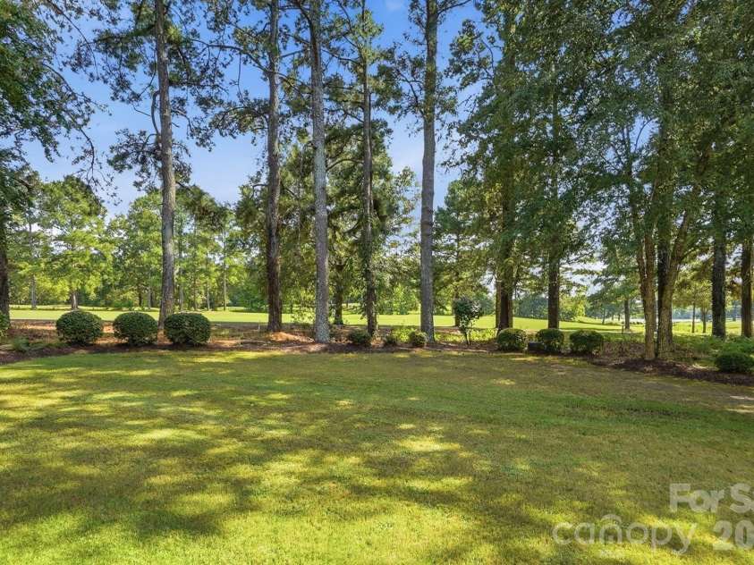 1159 Asheford Green Avenue, Concord, NC 28027.  MLS# CAR4420237, YatesRealty ID 48741. Beautiful golf course views from the backyard, backing directly to the second hole!