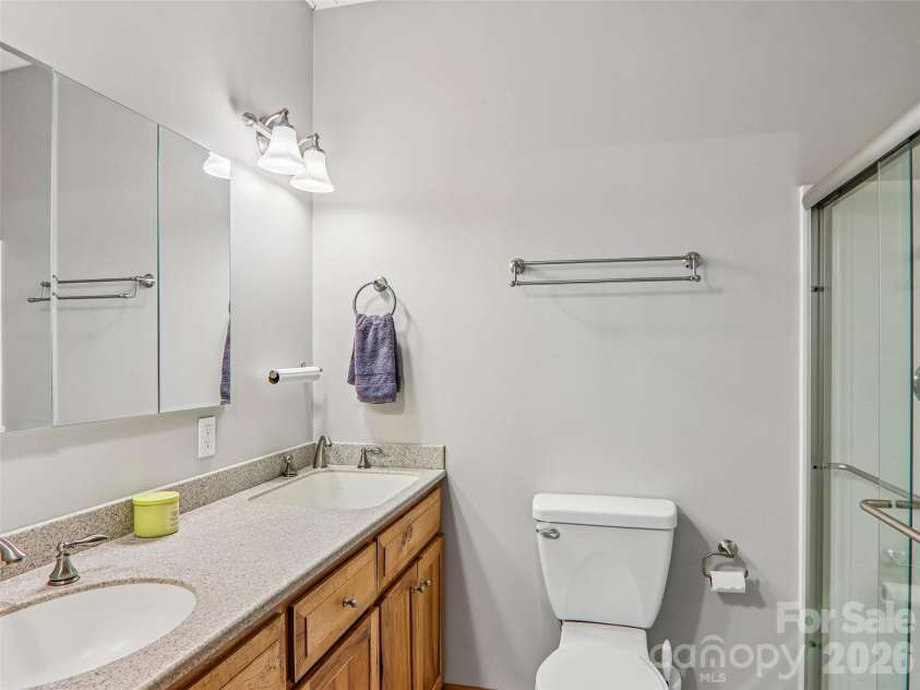 16 Hobe Crest, Hendersonville, NC 28792.  MLS# CAR4420313, YatesRealty ID 48745. Guest Full bath double sinks lower level.