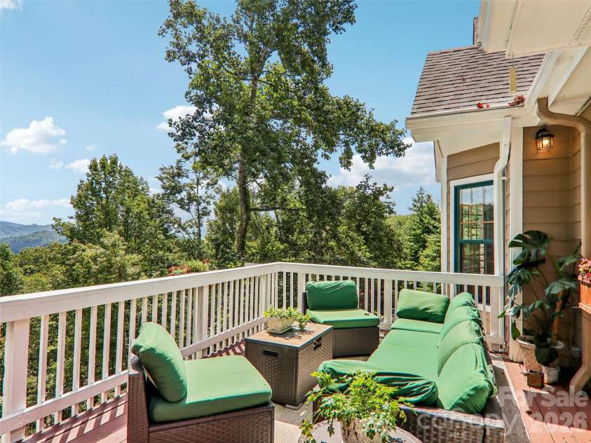 16 Hobe Crest, Hendersonville, NC 28792.  MLS# CAR4420313, YatesRealty ID 48745. Main level deck with expansive mountain views.