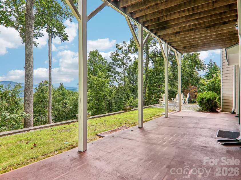 16 Hobe Crest, Hendersonville, NC 28792.  MLS# CAR4420313, YatesRealty ID 48745. Patio on lower level.
