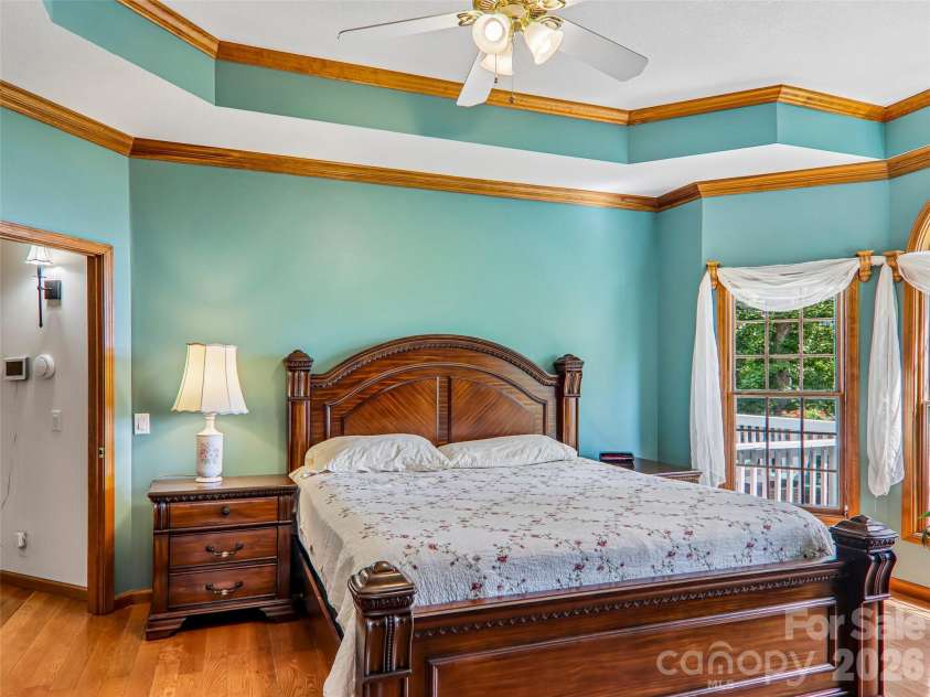 16 Hobe Crest, Hendersonville, NC 28792.  MLS# CAR4420313, YatesRealty ID 48745. Primary bedroom w/ Tray ceiling.